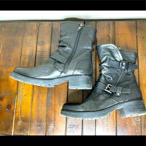 Black leather motorcycle boots.